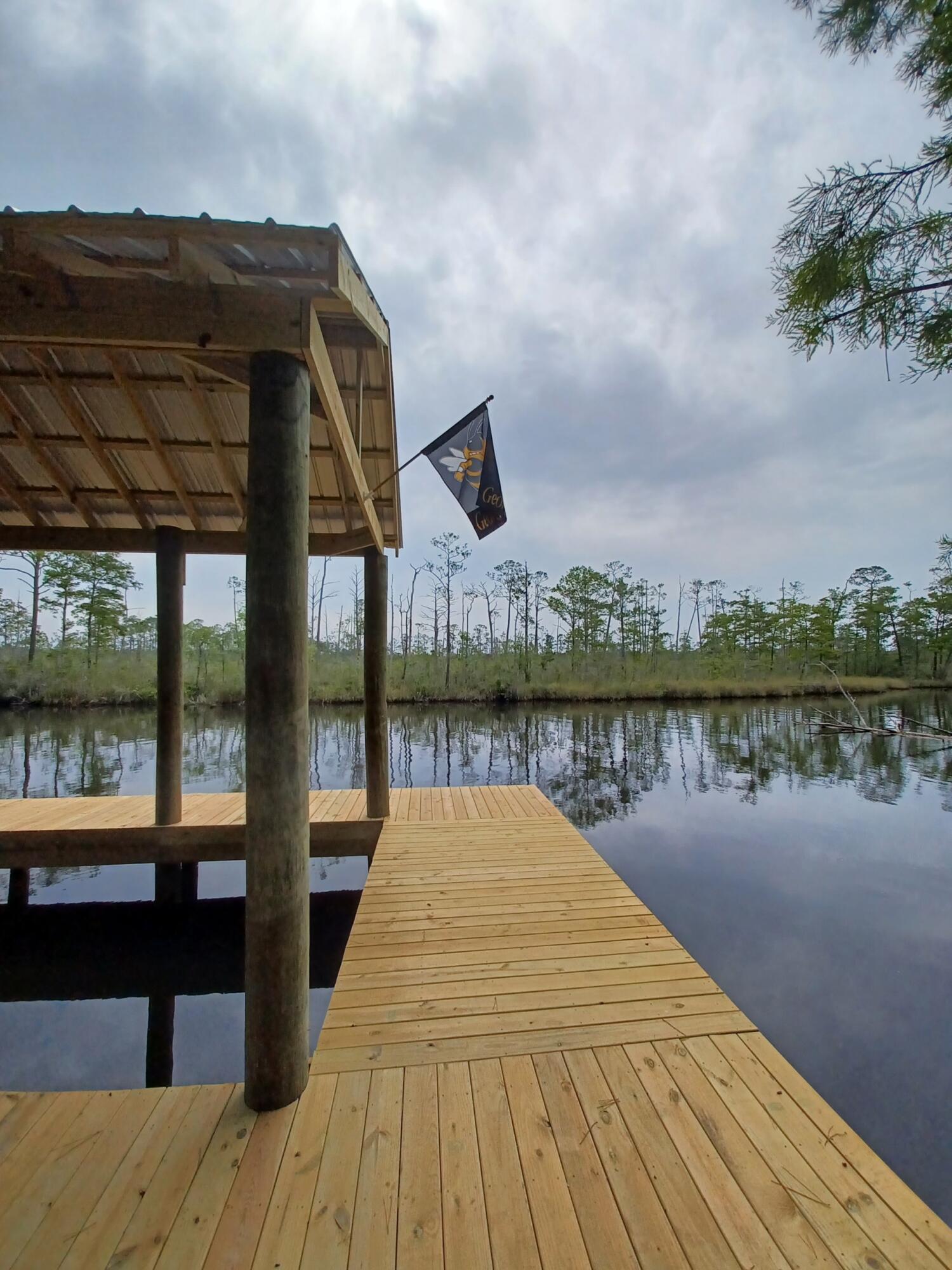 305 Portland Park Road Freeport, FL 32439 - Photo 6 of 7 a lake view with a lake view