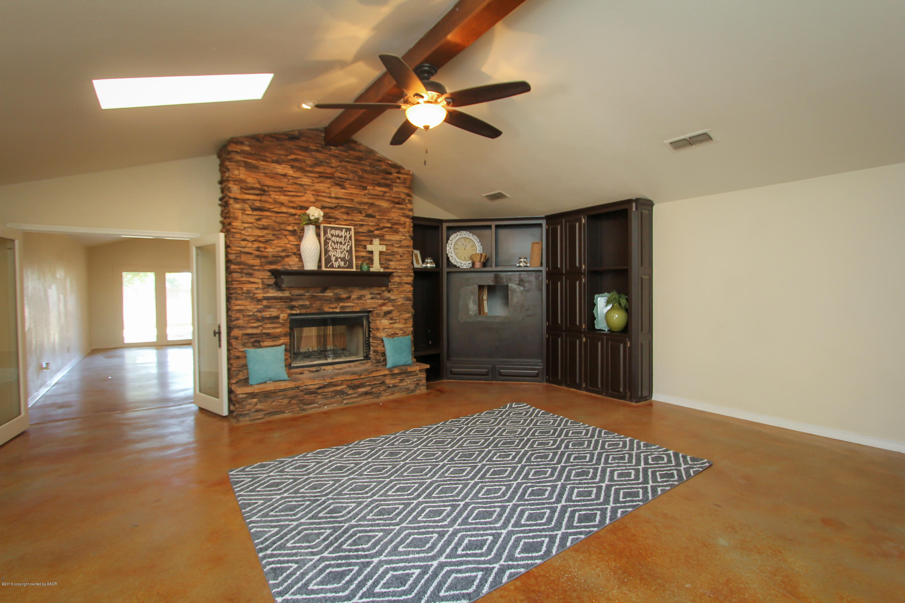 7915 Santa Fe Trail Amarillo, TX 79110 - Photo 3 of 57 a view of livingroom with hardwood floor and a ceiling fan