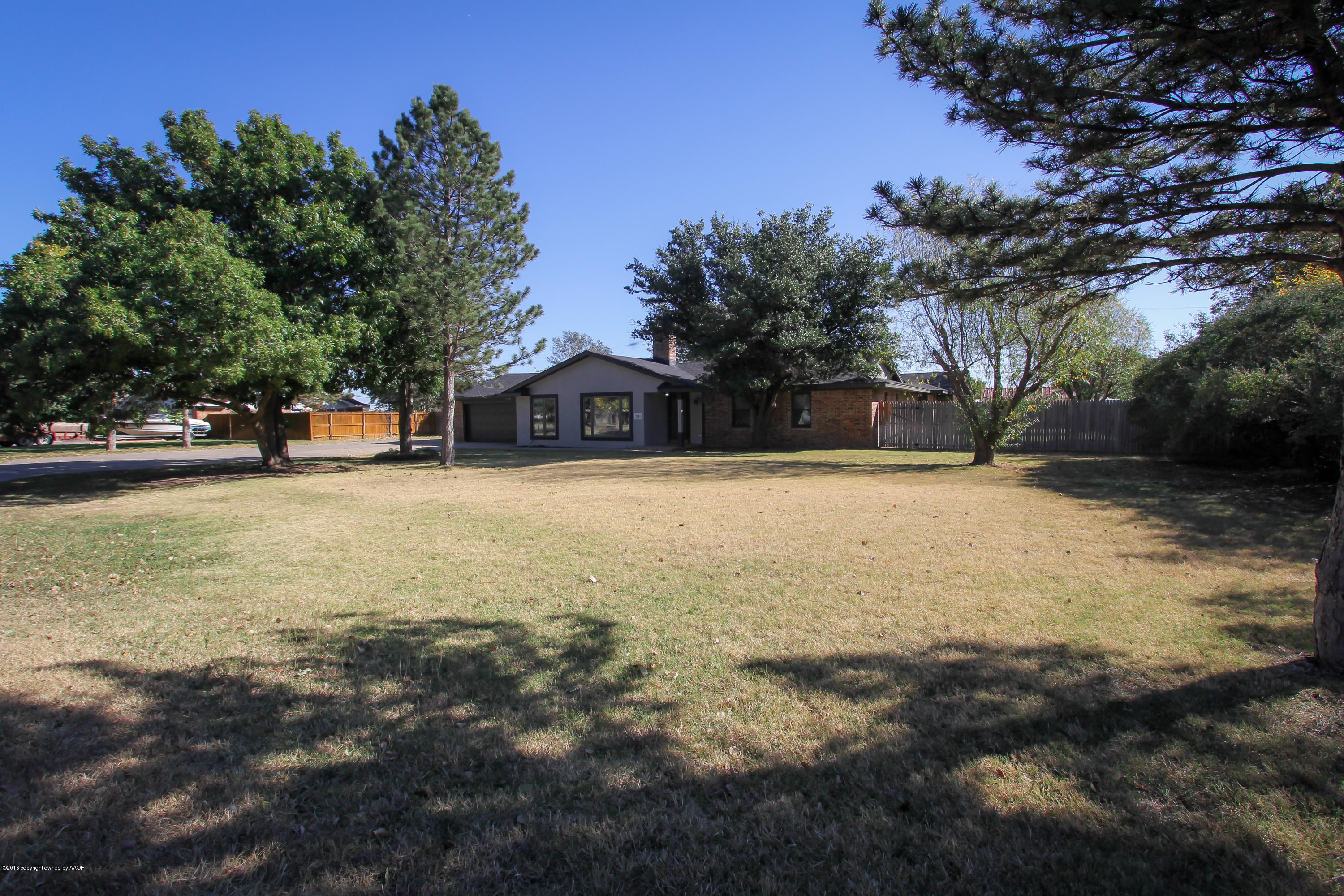 7915 Santa Fe Trail Amarillo, TX 79110 - Photo 35 of 57 a view of swimming pool with an outdoor space and seating area