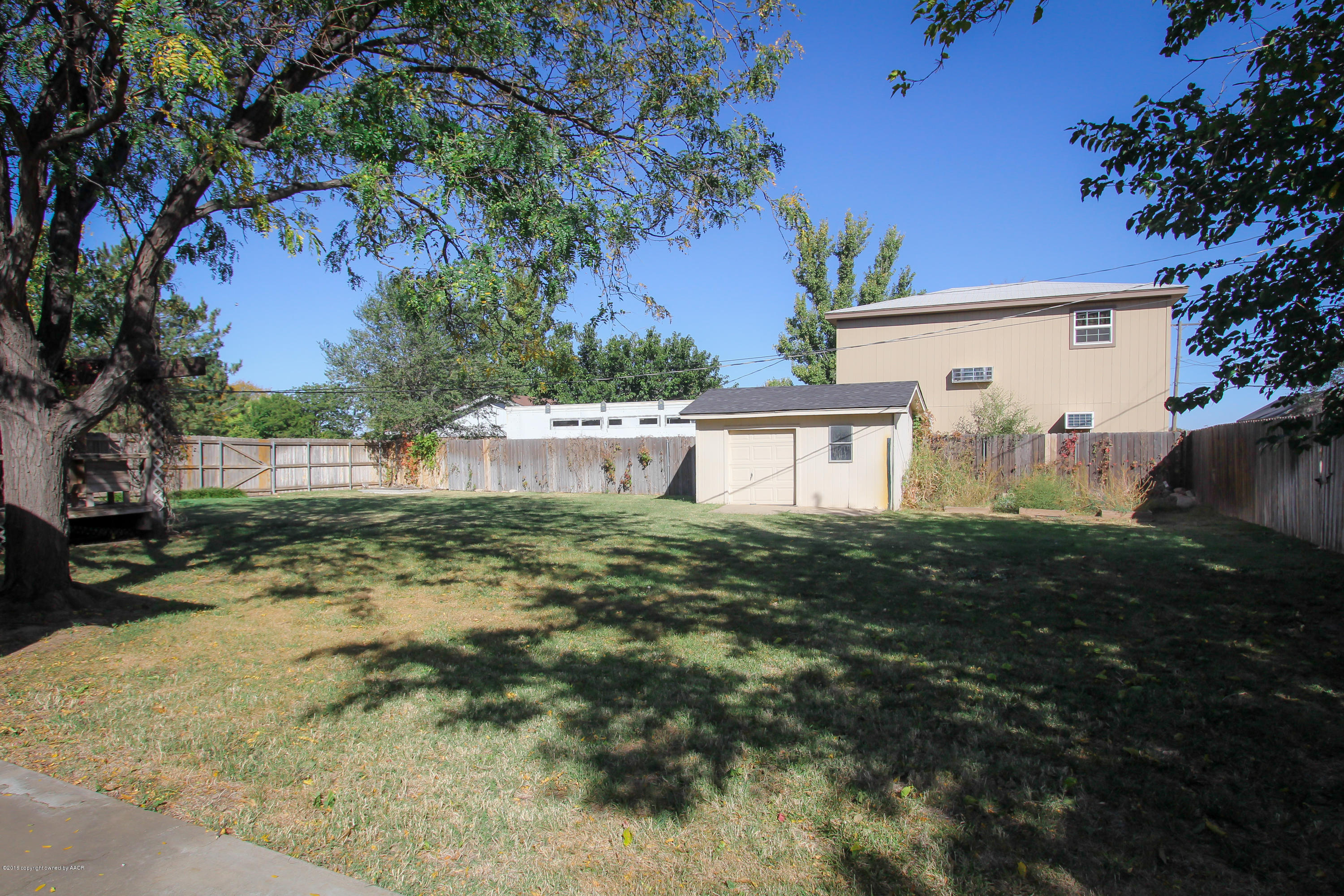 7915 Santa Fe Trail Amarillo, TX 79110 - Photo 49 of 57 a view of a house with a yard