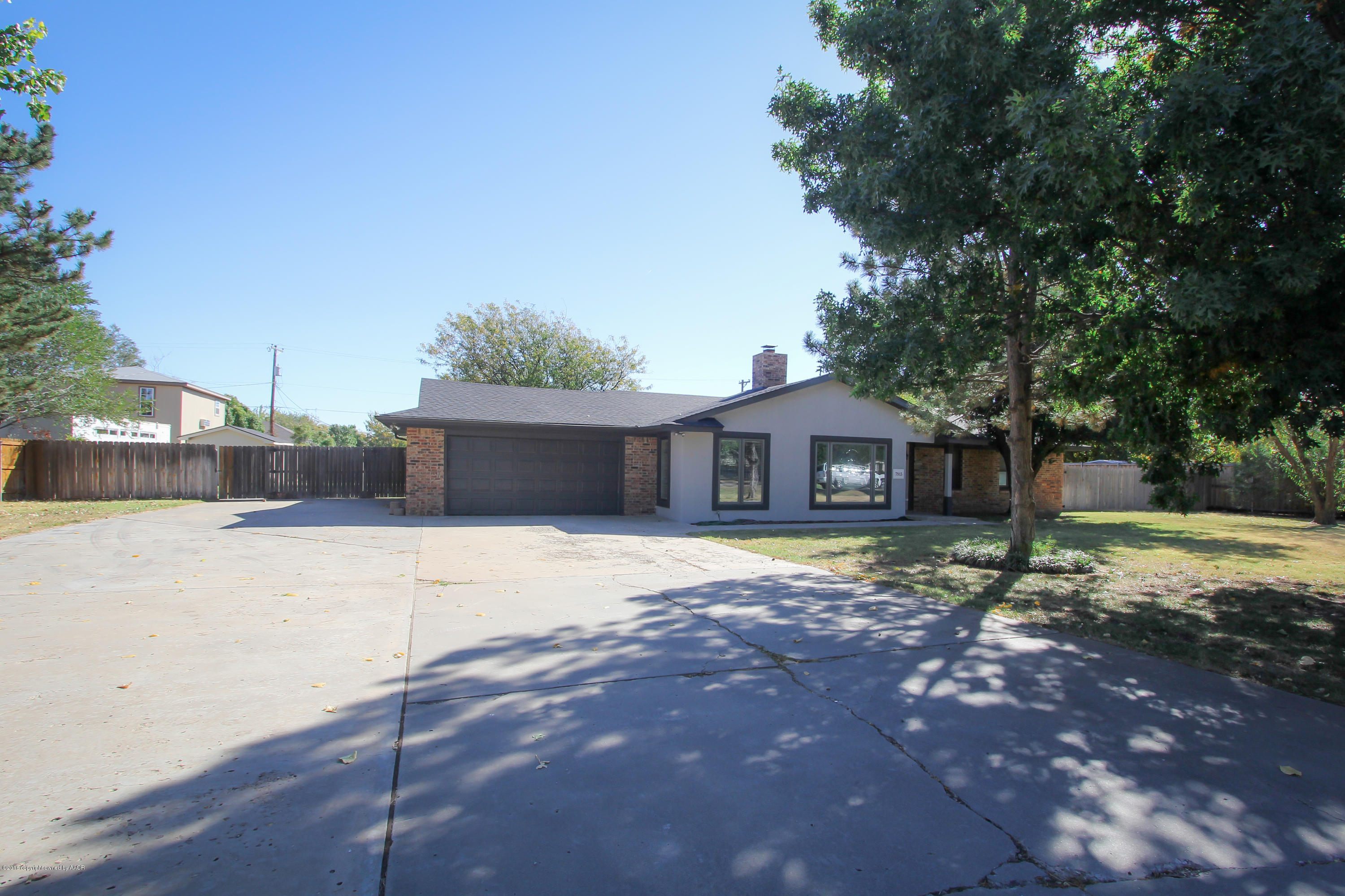 7915 Santa Fe Trail Amarillo, TX 79110 - Photo 57 of 57 a house with trees in the background
