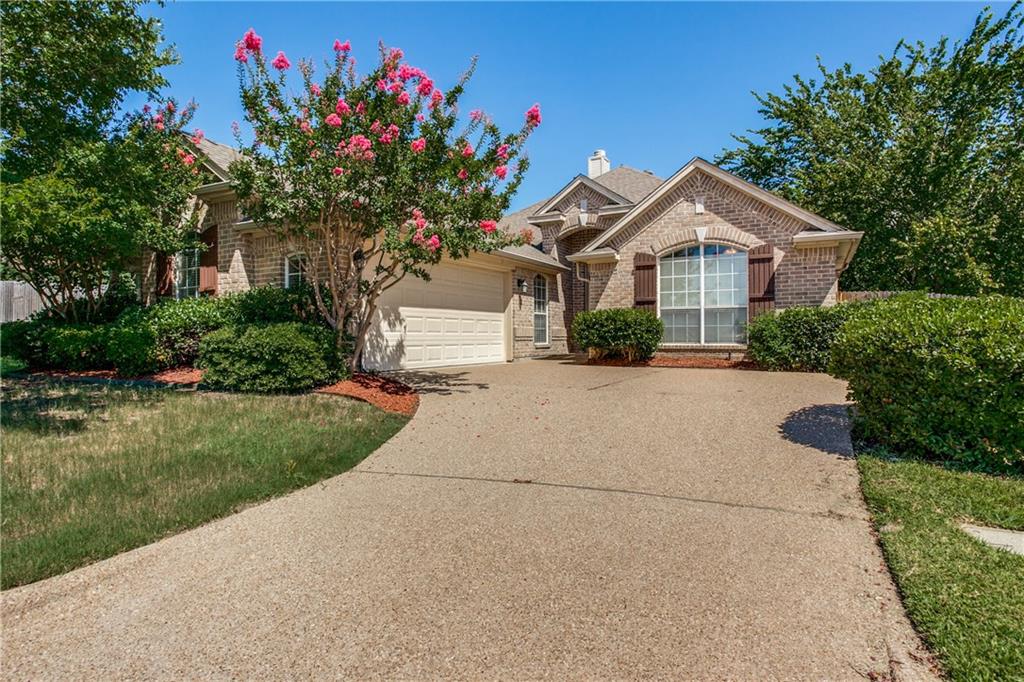 3815 Winding Road Arlington, TX 76016 - Photo 1 of 1 a front view of a house with a yard and a garage