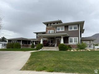 1343 East Maple Street Mapleton, UT 84664 - Photo 1 of 1 Prairie-style house with covered porch and a front yard