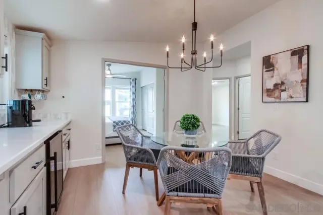a view of a patio with couches and potted plants