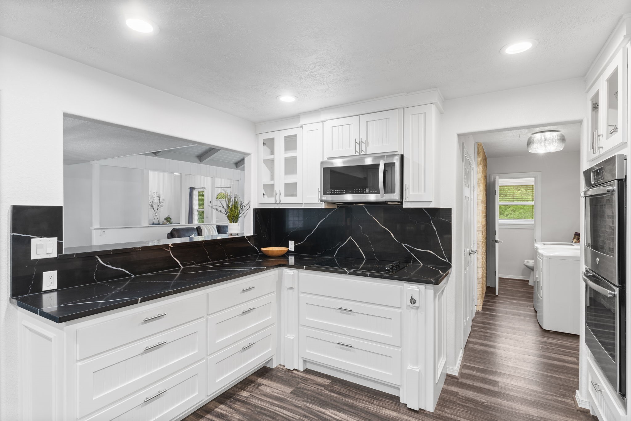 910 Imperial Lane Houston, TX 77336 - Photo 11 of 26 a kitchen with a sink stove and refrigerator
