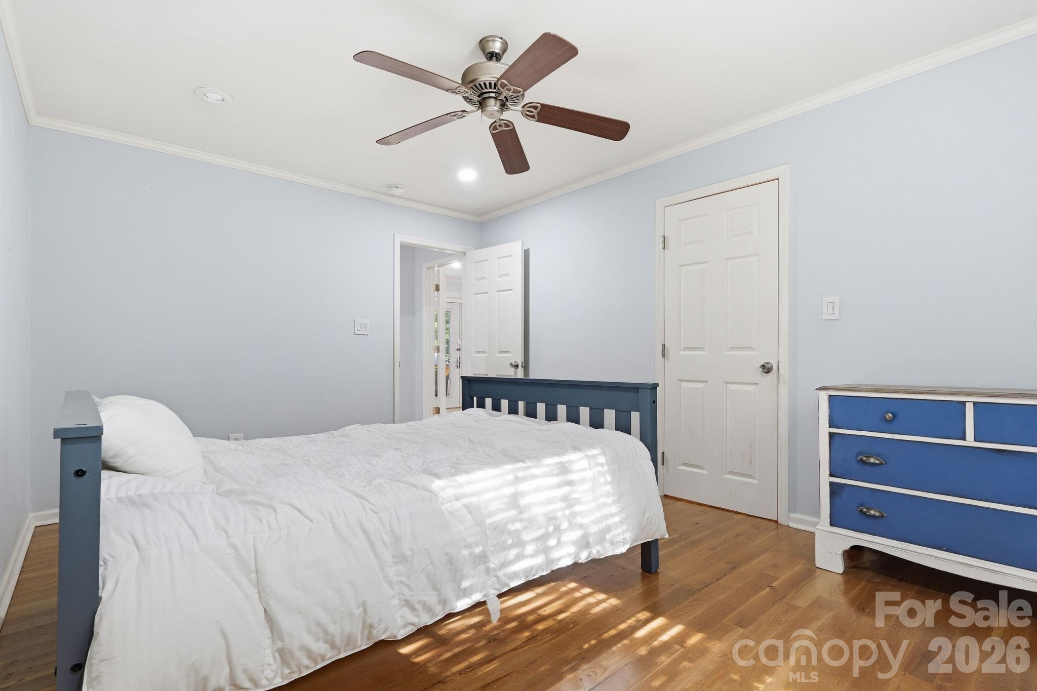 5347 Haney Road York, SC 29745 - Photo 16 of 39 a bedroom with a bed and a ceiling fan