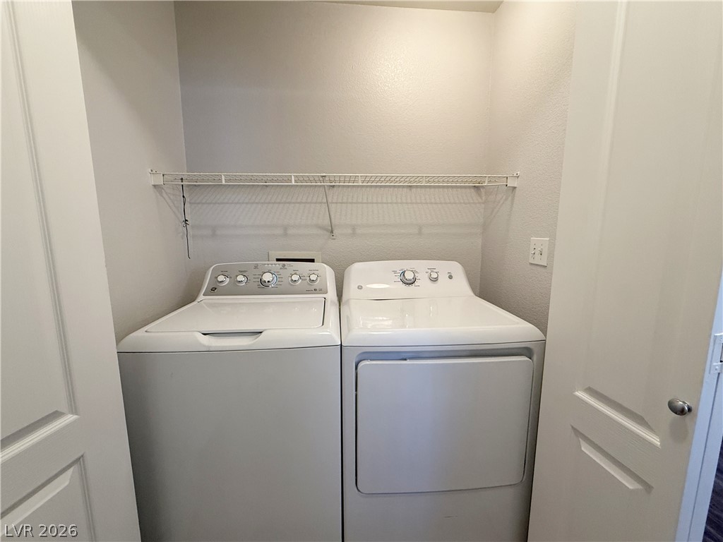 2185 Polynesia Circle Henderson, NV 89074 - Photo 15 of 37 A well-appointed laundry area offers a convenient washer and dryer for effortless household chores.