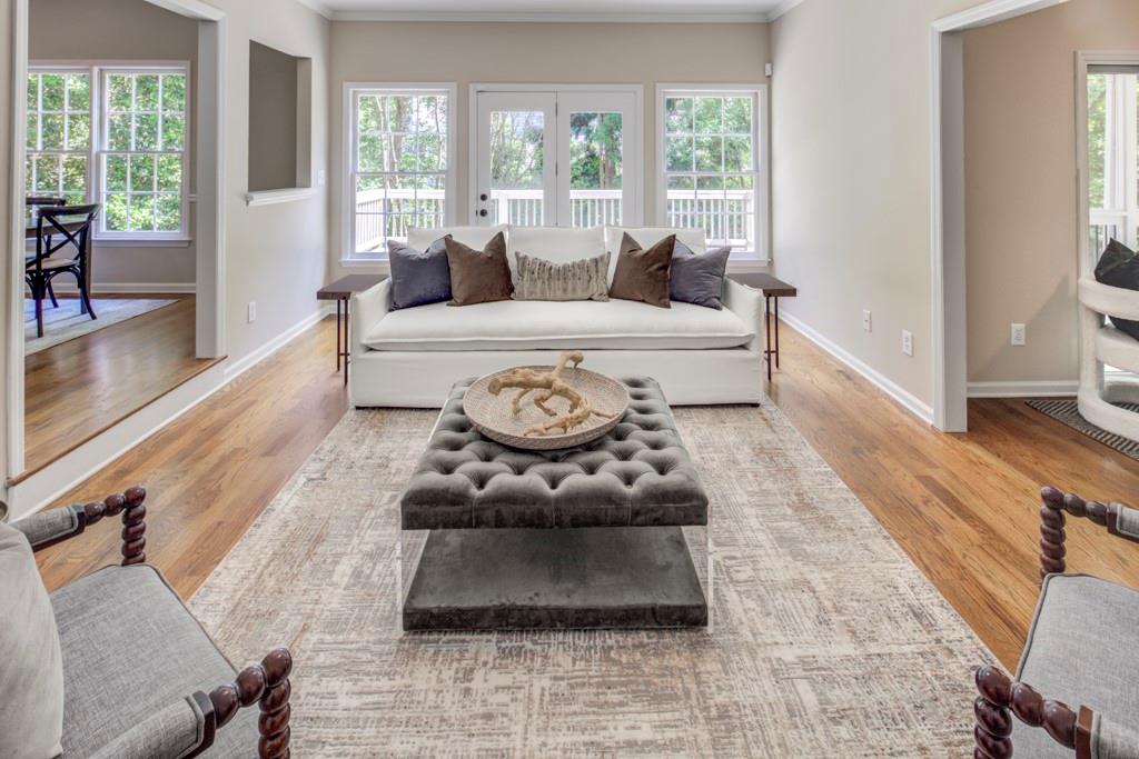 2059 Howell Mill Road Northwest Atlanta, GA 30318 - Photo 11 of 28 a living room with furniture and a large window
