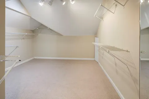 a view of a room with racks on the wall