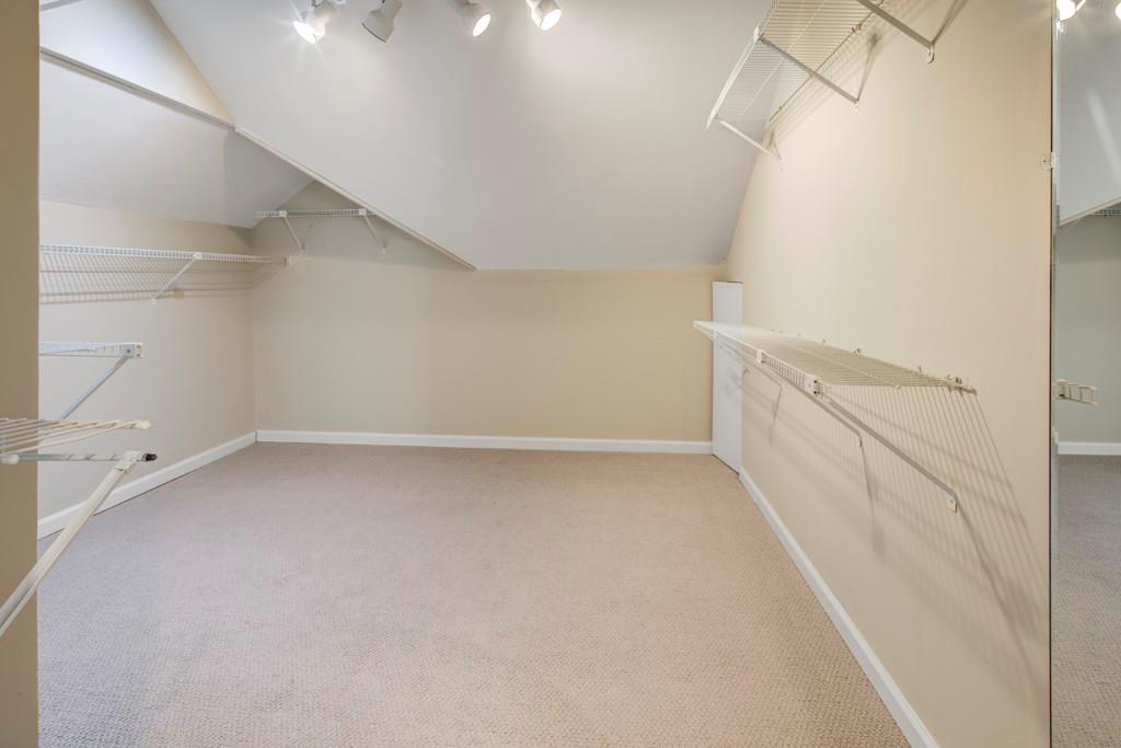 2059 Howell Mill Road Northwest Atlanta, GA 30318 - Photo 18 of 28 a view of a room with racks on the wall