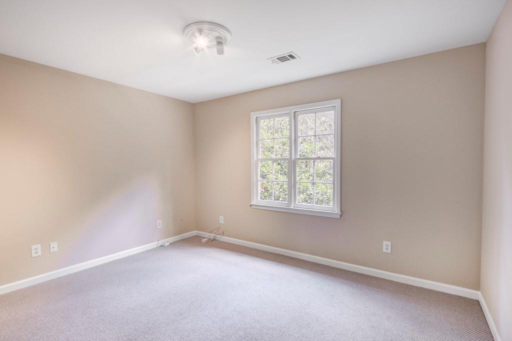 2059 Howell Mill Road Northwest Atlanta, GA 30318 - Photo 19 of 28 an empty room with a window