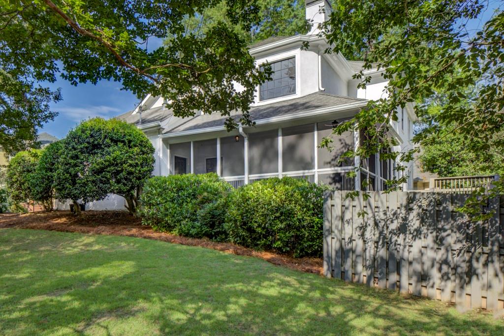 2059 Howell Mill Road Northwest Atlanta, GA 30318 - Photo 26 of 28 a view of house with a yard