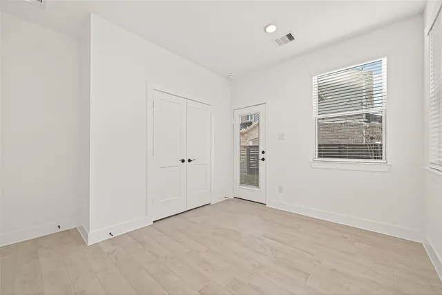 an empty room with windows