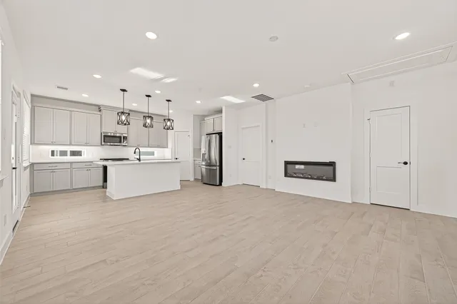 a view of a kitchen with a sink cabinets and window