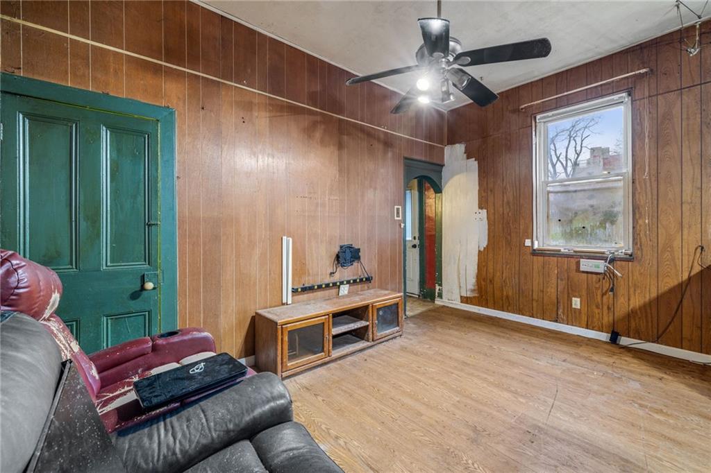 10 Welsh Way Pittsburgh, PA 15203 - Photo 31 of 46 a living room with furniture and a chandelier