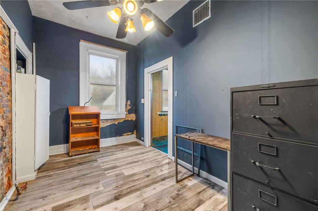 10 Welsh Way Pittsburgh, PA 15203 - Photo 36 of 46 a bedroom with a bed and a dresser