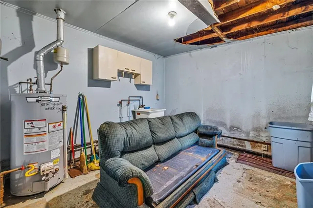 a room with a bed and furniture