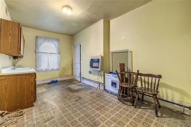 a view of a room with a large window