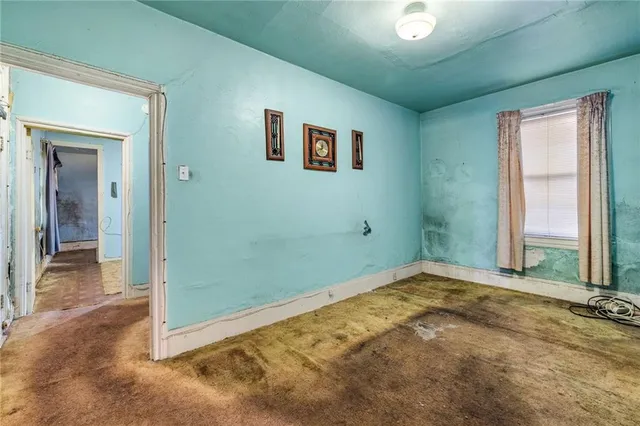 a bathroom with a toilet a sink and bathtub