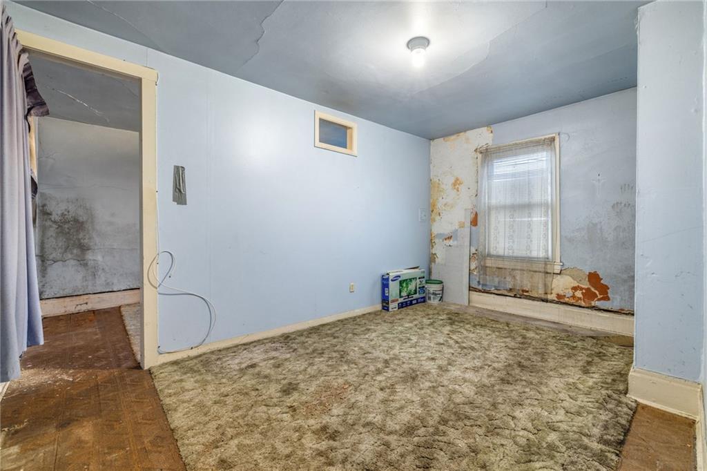 10 Welsh Way Pittsburgh, PA 15203 - Photo 45 of 46 a bedroom with a bed and a window