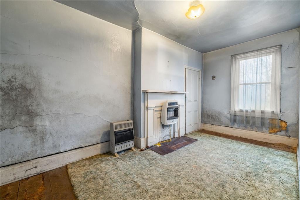 10 Welsh Way Pittsburgh, PA 15203 - Photo 46 of 46 a view of an empty room with a fireplace