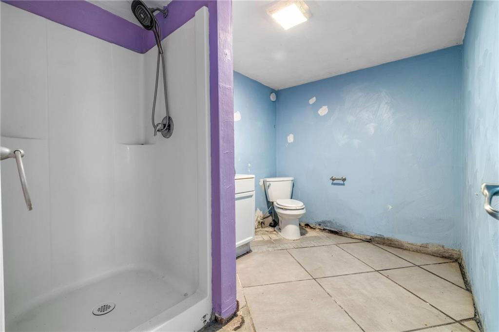 10 Welsh Way Pittsburgh, PA 15203 - Photo 9 of 46 a bathroom with a toilet and a shower