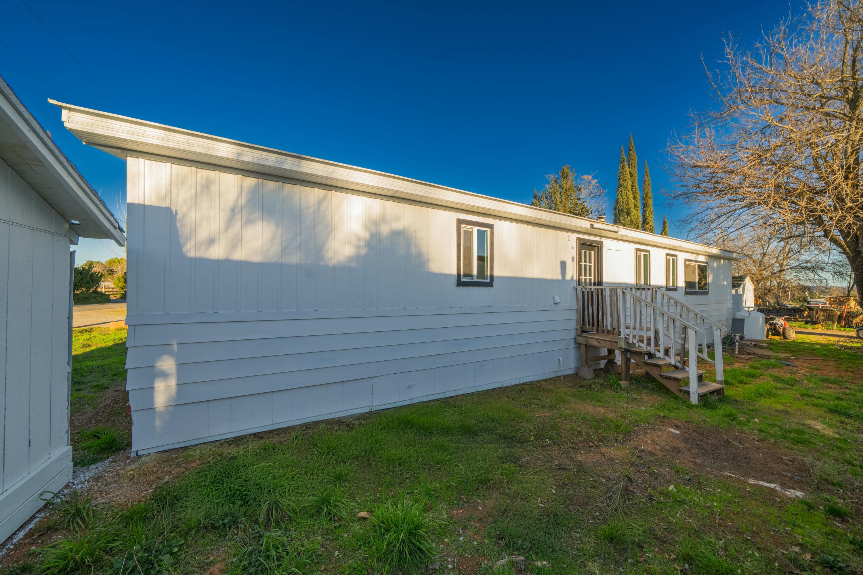22235 Lone Tree Road, Unit 4 Anderson, CA 96007 - Photo 15 of 15 a view of backyard with deck