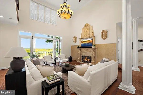 a view of a living room and wooden floor