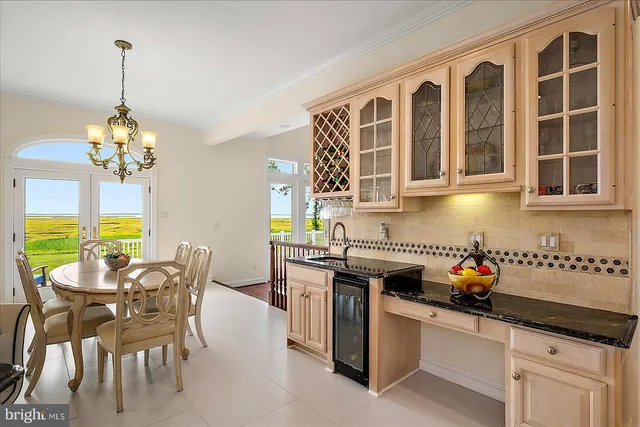 a bathroom with a double vanity sink mirror and shower