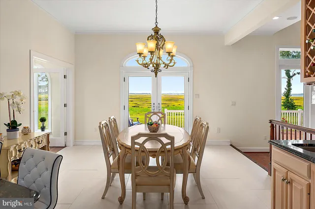 a bathroom with a sink shower a mirror and a bathtub