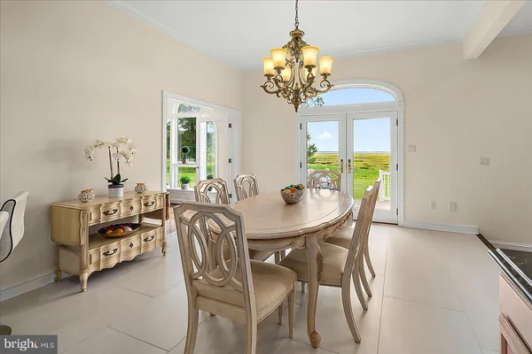 a white bath tub sitting in a bathroom
