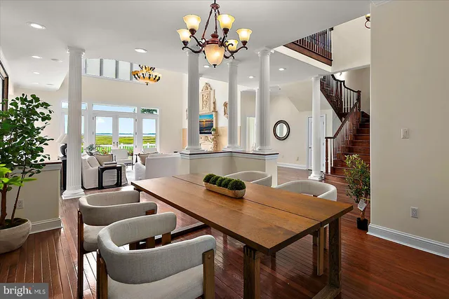 a bathroom with a granite countertop sink mirror and a toilet