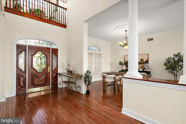 a view of yard with swimming pool and green space