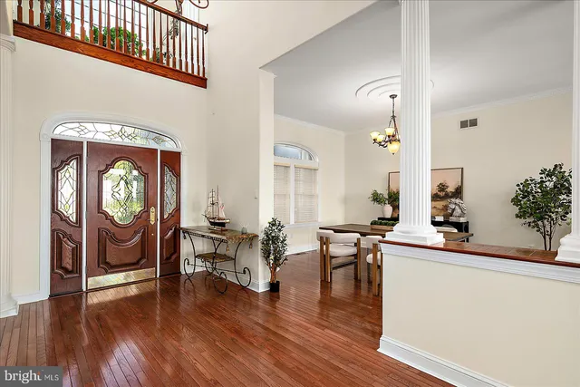 a view of yard with swimming pool and green space