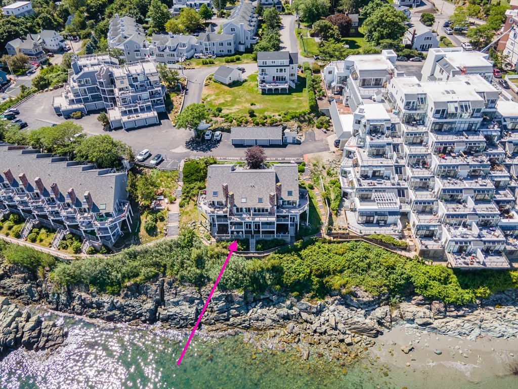 22 Oceanside Drive, Unit 22 Hull, MA 02045 - Photo 2 of 37 an aerial view of a city
