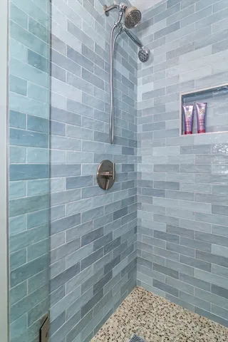 a bedroom with double bed and a view of kitchen