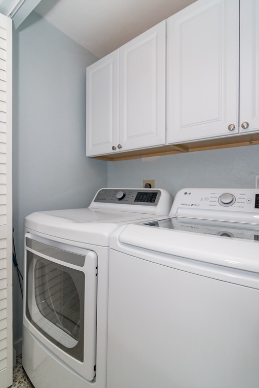 22 Oceanside Drive, Unit 22 Hull, MA 02045 - Photo 28 of 37 a utility room with dryer and washer