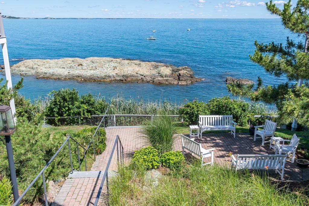 22 Oceanside Drive, Unit 22 Hull, MA 02045 - Photo 34 of 37 a view of a lake with outdoor space