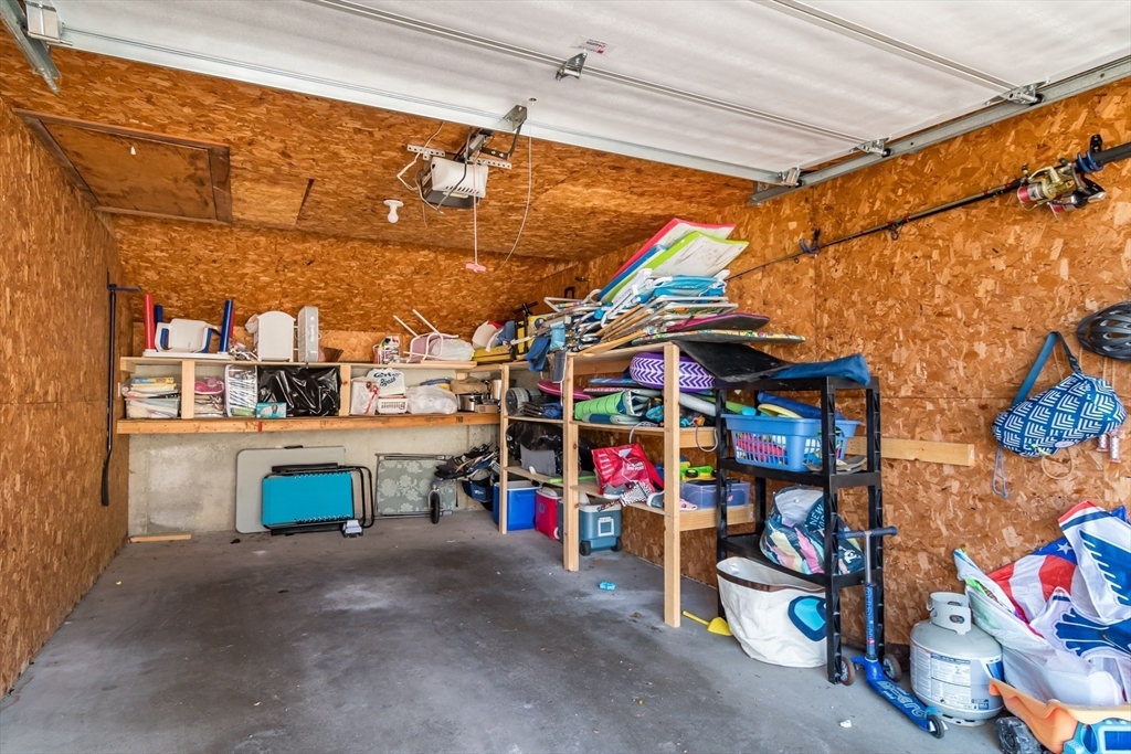 22 Oceanside Drive, Unit 22 Hull, MA 02045 - Photo 37 of 37 a view of storage and utility room