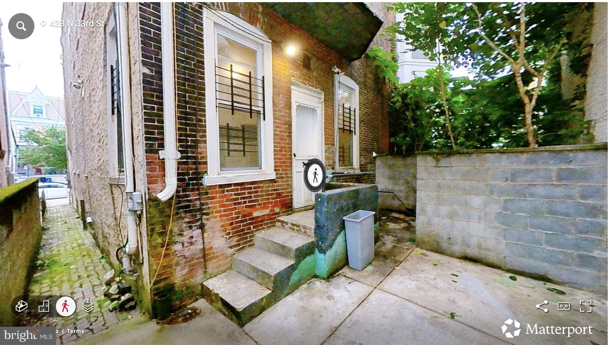 433 North 33rd Street Philadelphia, PA 19104 - Photo 13 of 27 a front view of a house with a yard