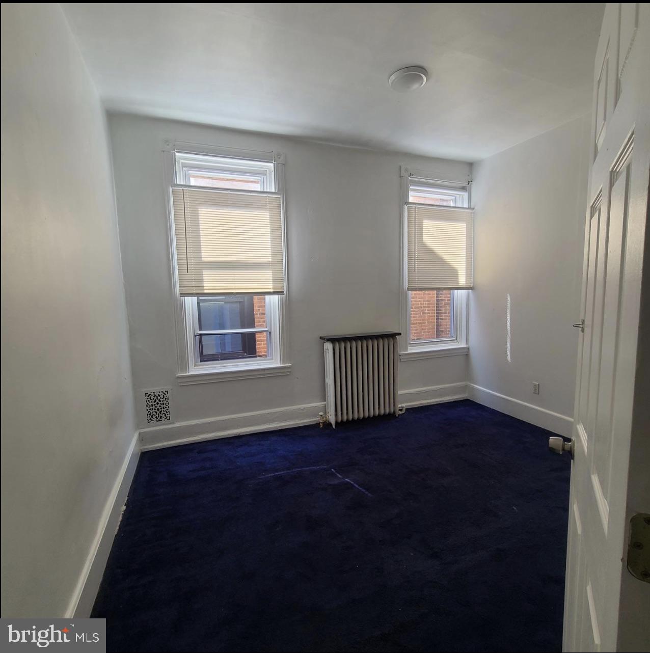 433 North 33rd Street Philadelphia, PA 19104 - Photo 20 of 27 a view of an empty room with wooden floor and a window