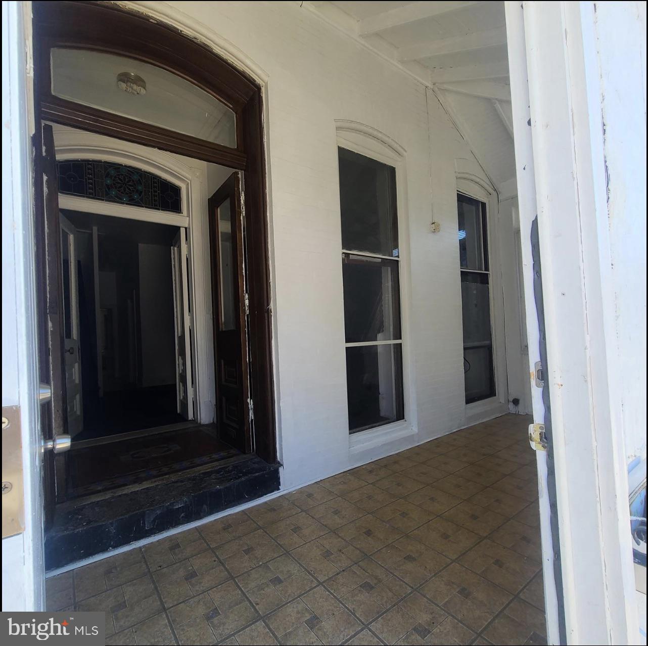 433 North 33rd Street Philadelphia, PA 19104 - Photo 3 of 27 a view of a hallway with wooden walls and door
