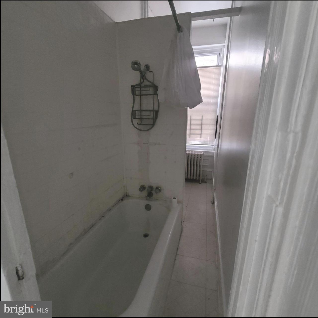 433 North 33rd Street Philadelphia, PA 19104 - Photo 10 of 27 a bathroom with a bathtub and shower