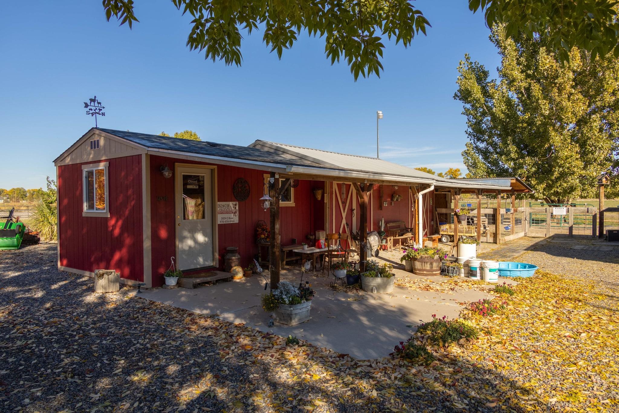 2034 J Road Fruita, CO 81521 - Photo 25 of 38 a view of house with outdoor space and sitting area