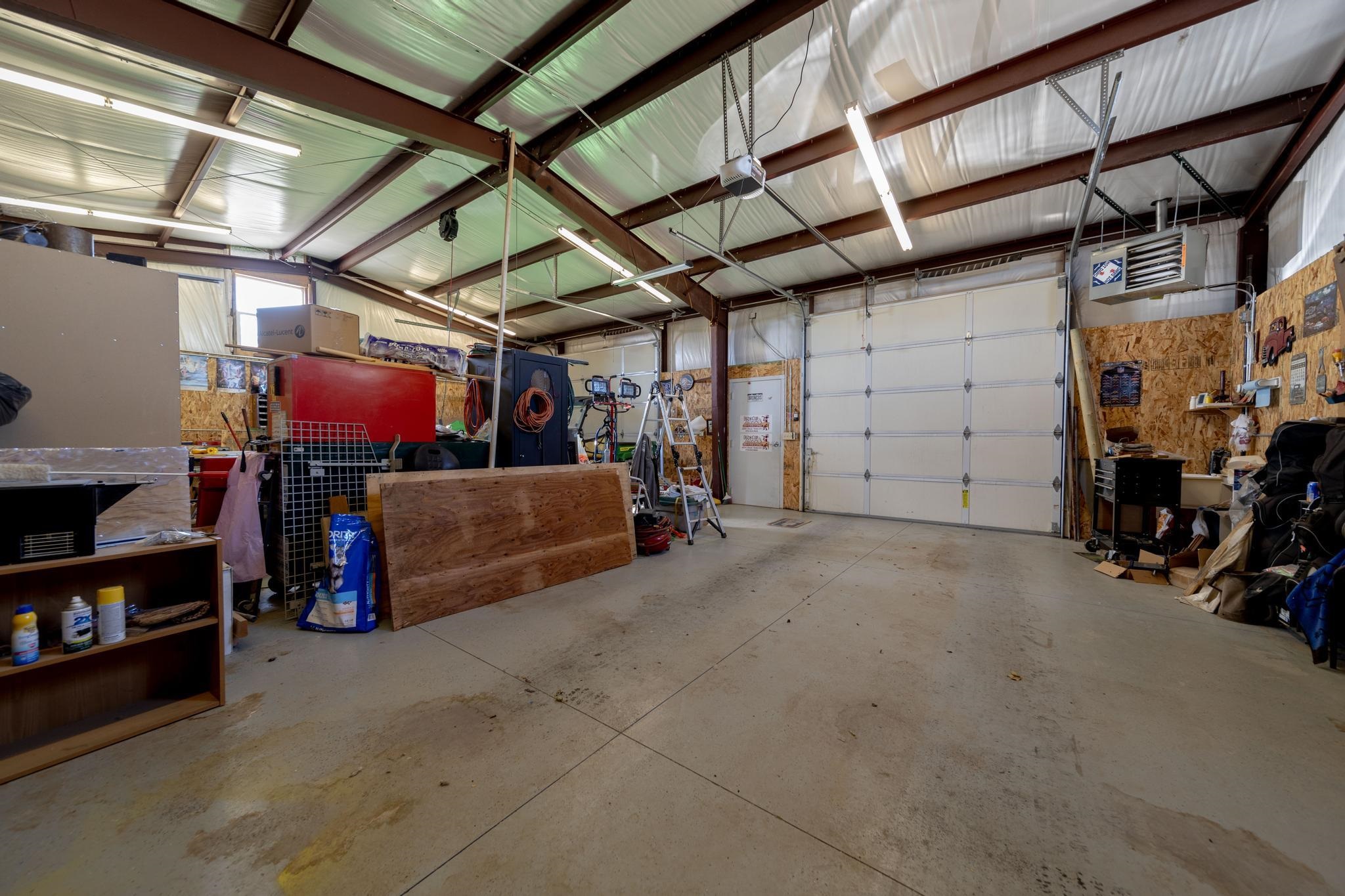2034 J Road Fruita, CO 81521 - Photo 30 of 38 a view of a garage with storage