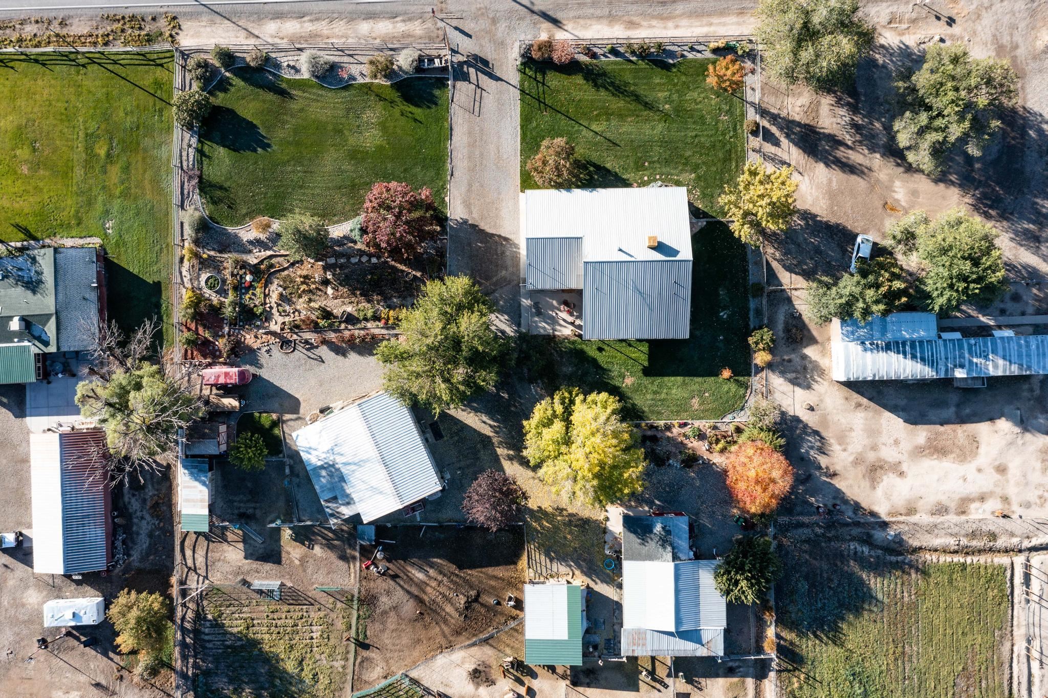 2034 J Road Fruita, CO 81521 - Photo 38 of 38 an aerial view of a house with a lake view