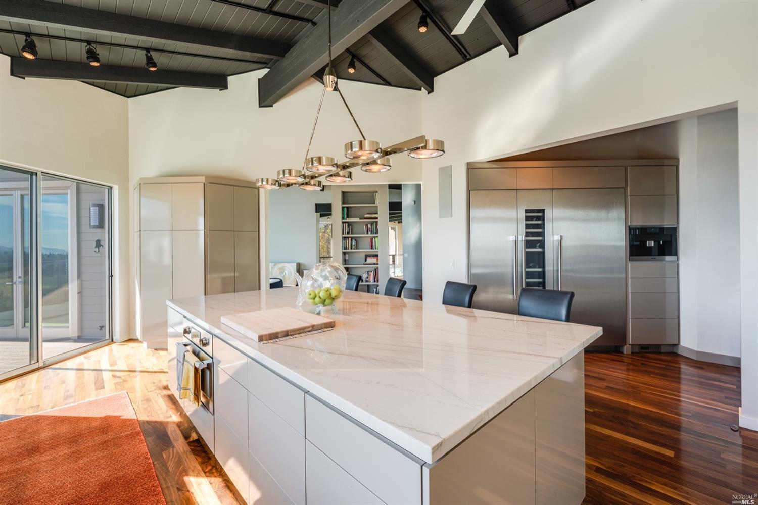 9 Bournemouth Road St. Helena, CA 94574 - Photo 11 of 40 a large kitchen with a table and chairs