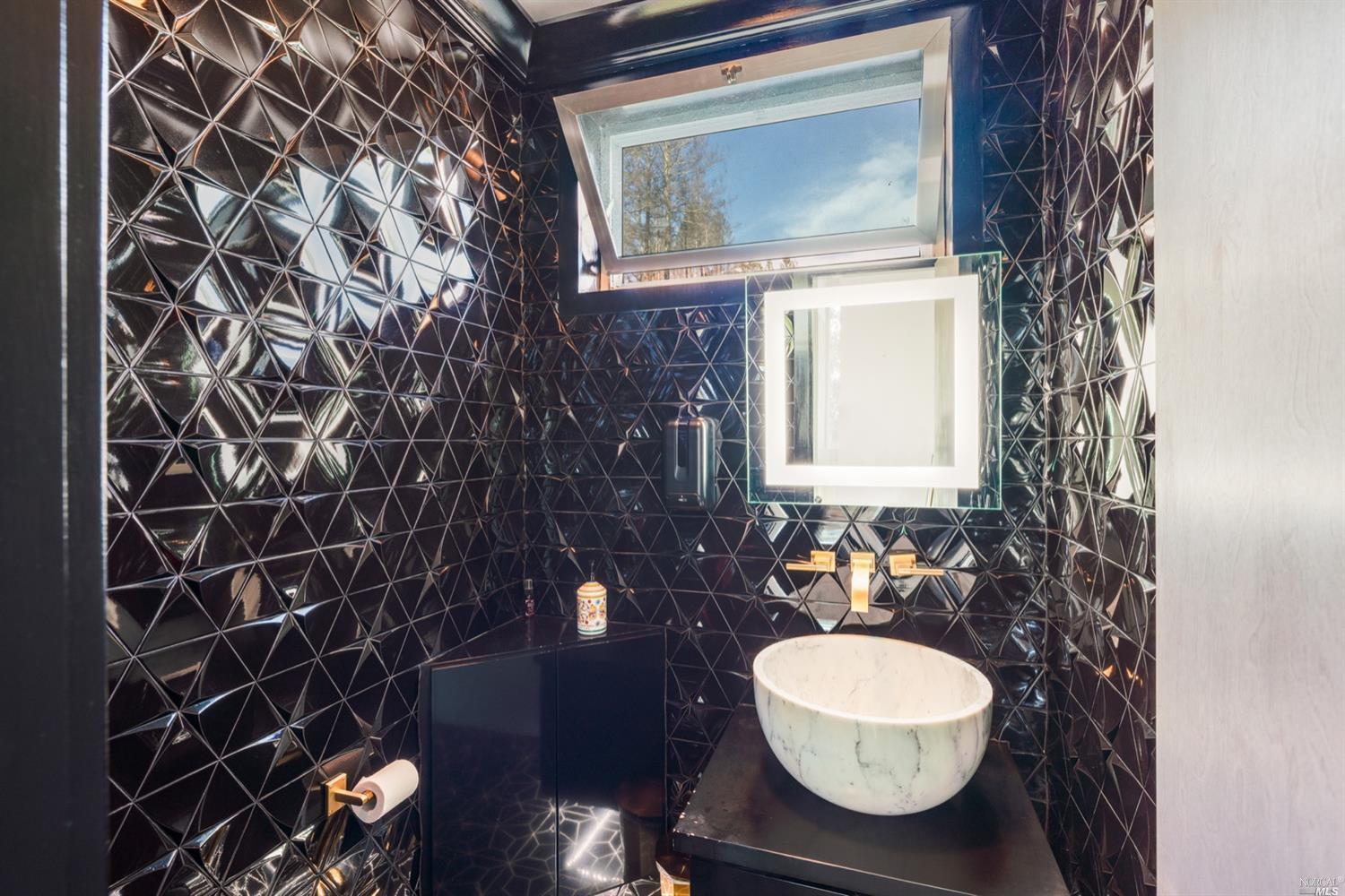 9 Bournemouth Road St. Helena, CA 94574 - Photo 12 of 40 a bathroom with a toilet a sink and mirror