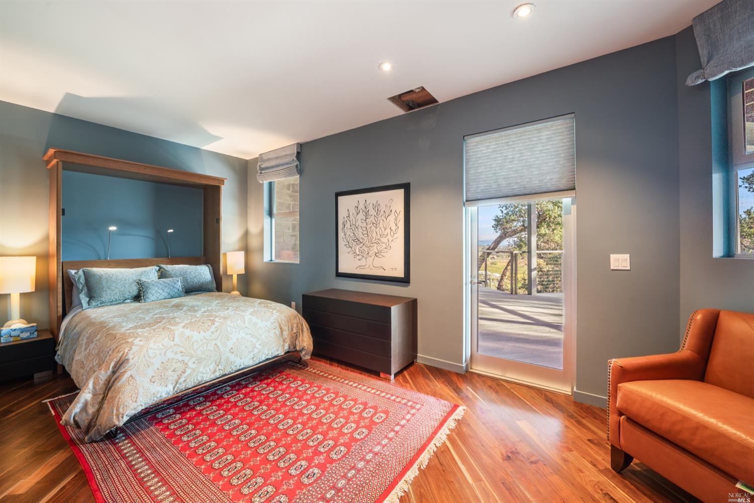 9 Bournemouth Road St. Helena, CA 94574 - Photo 23 of 40 a bedroom with a bed and a couch