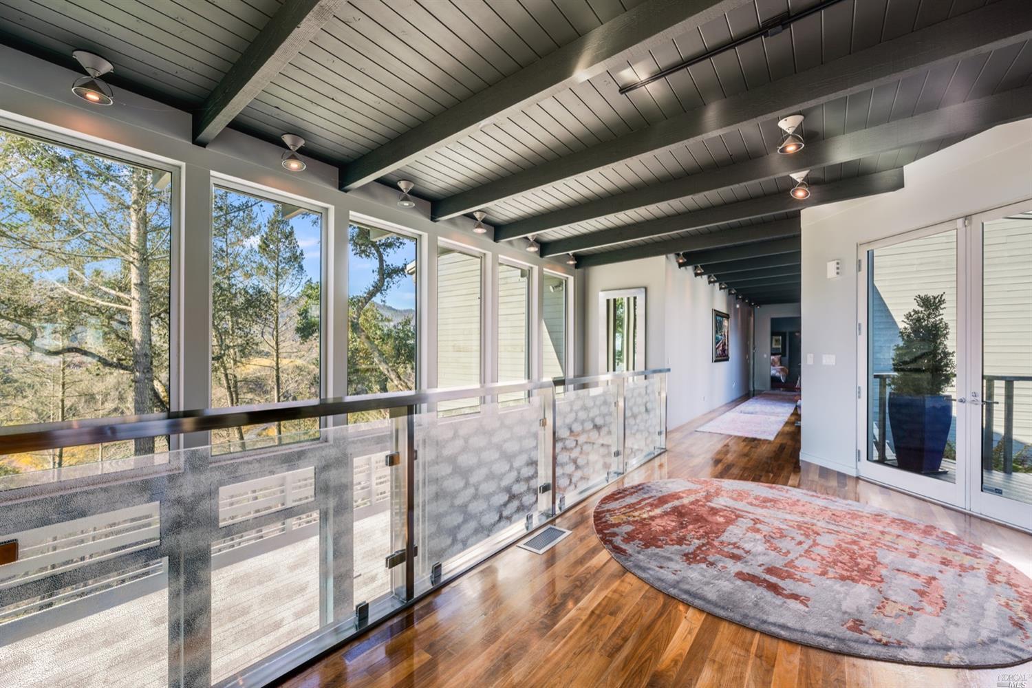 9 Bournemouth Road St. Helena, CA 94574 - Photo 3 of 40 a living room with large windows
